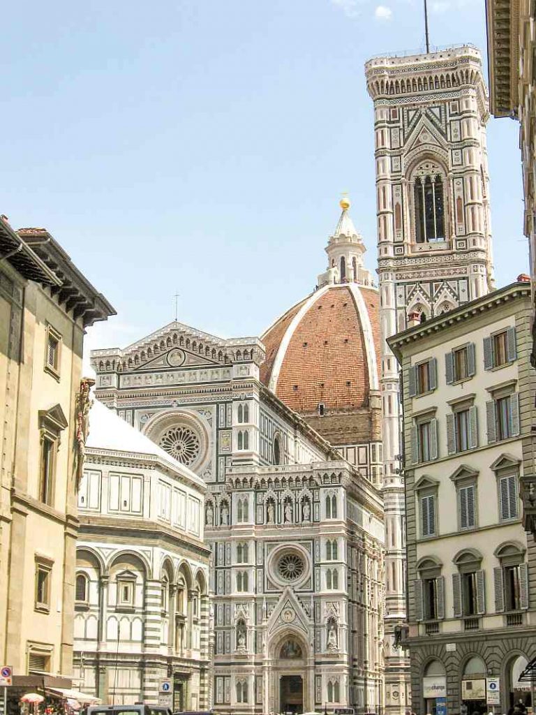 beautiful buildings of white, rose and green marmor, the cathedral complex in Florence