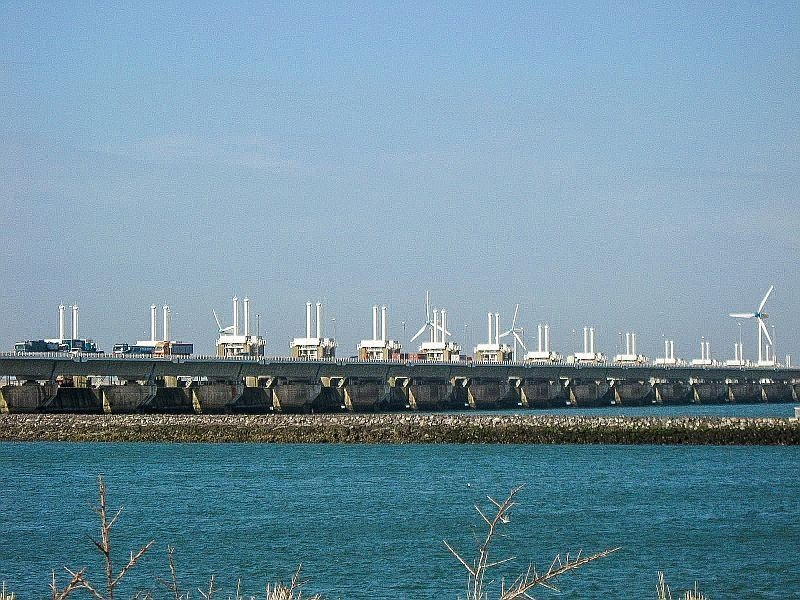 water surge barrier on pillars with gates in the sea, Delta Works in the Netherlands