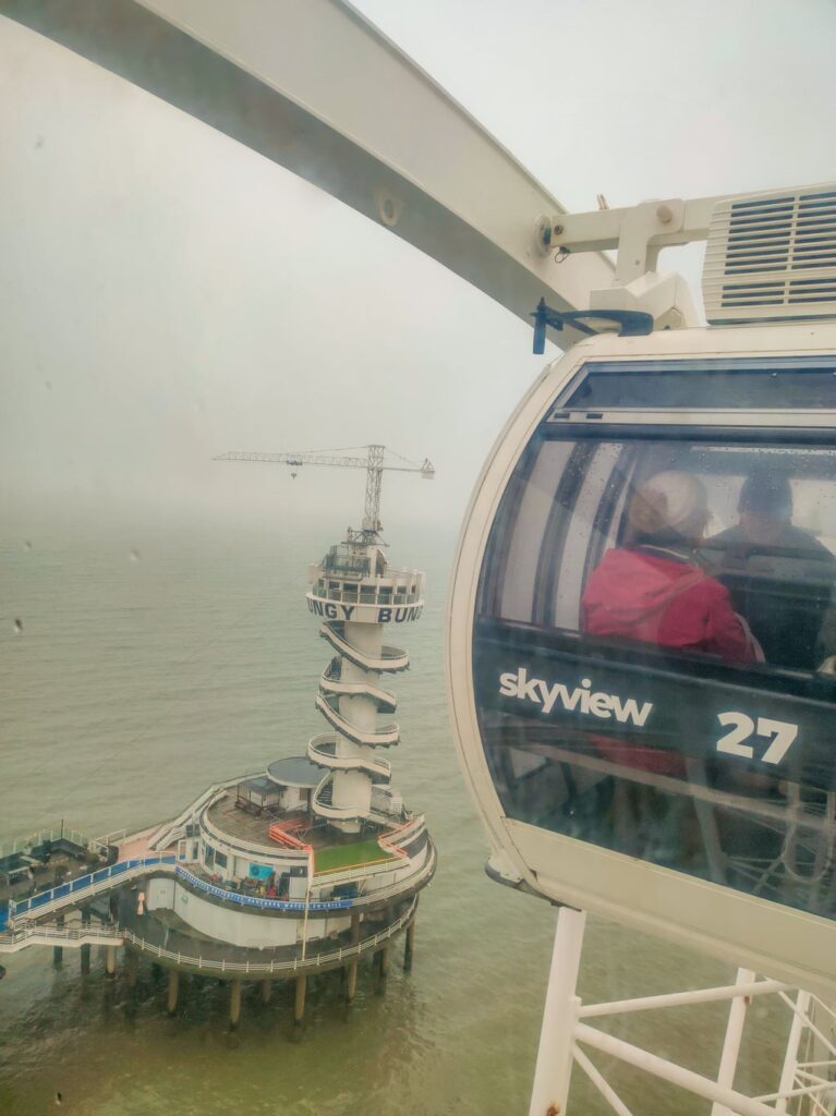 a view from a cabin on a Ferris wheel in Scheveningen