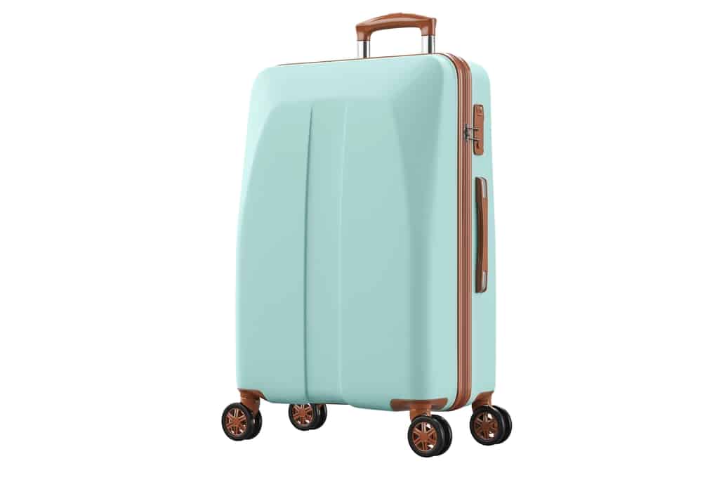 A mint green hard-shell suitcase with brown accents and four spinner wheels is shown standing upright on a white background.